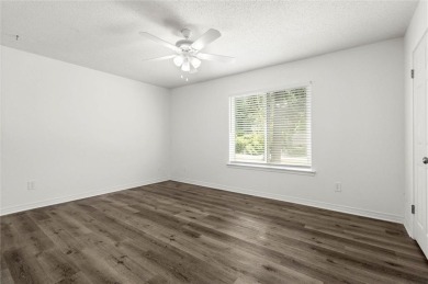 This remodeled 3-bedroom, 2-bath brick home is centrally located on Lake Forest Yacht and Country Club in Alabama - for sale on GolfHomes.com, golf home, golf lot
