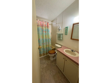 Welcome to your perfect sunny Florida getaway! This beautifully on Sabal Springs Golf and Racquet Club in Florida - for sale on GolfHomes.com, golf home, golf lot