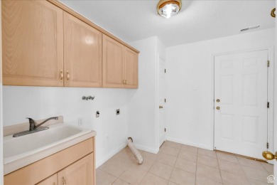 This well maintained home is nestled in the desirable Green on Green Spring Country Club in Utah - for sale on GolfHomes.com, golf home, golf lot