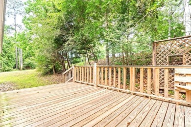This remodeled 3-bedroom, 2-bath brick home is centrally located on Lake Forest Yacht and Country Club in Alabama - for sale on GolfHomes.com, golf home, golf lot