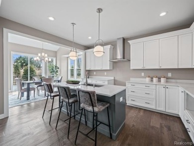 Stunning New Construction End-Unit Condo, adjacent to the on Pine Trace Golf Club in Michigan - for sale on GolfHomes.com, golf home, golf lot