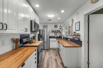Discover this beautifully updated 4-bedroom, 2-bathroom home on Meadowbrook Golf Course in Texas - for sale on GolfHomes.com, golf home, golf lot