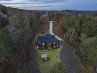 Nestled along the pristine 1st fairway of Currahee Club, this on Currahee Golf Club in Georgia - for sale on GolfHomes.com, golf home, golf lot