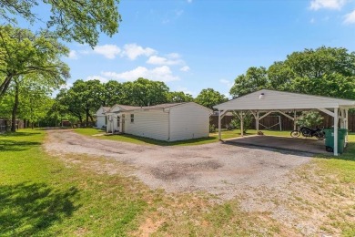 Discover this beautifully updated 4-bedroom, 2-bathroom home on Meadowbrook Golf Course in Texas - for sale on GolfHomes.com, golf home, golf lot