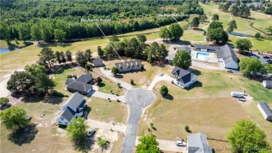 Welcome to this charming 3-bedroom, 2.5-bath home on Hole One of on Sandy Ridge Country Club in North Carolina - for sale on GolfHomes.com, golf home, golf lot