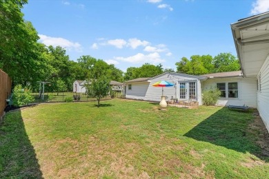 Discover this beautifully updated 4-bedroom, 2-bathroom home on Meadowbrook Golf Course in Texas - for sale on GolfHomes.com, golf home, golf lot