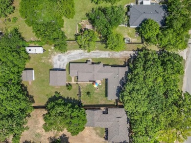 Discover this beautifully updated 4-bedroom, 2-bathroom home on Meadowbrook Golf Course in Texas - for sale on GolfHomes.com, golf home, golf lot