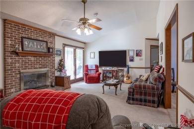 Welcome to this charming 3-bedroom, 2.5-bath home on Hole One of on Sandy Ridge Country Club in North Carolina - for sale on GolfHomes.com, golf home, golf lot