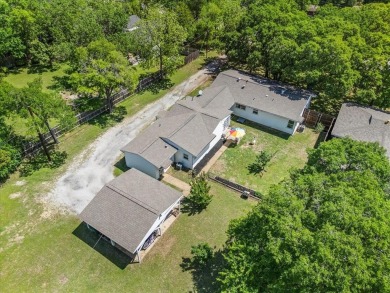 Discover this beautifully updated 4-bedroom, 2-bathroom home on Meadowbrook Golf Course in Texas - for sale on GolfHomes.com, golf home, golf lot