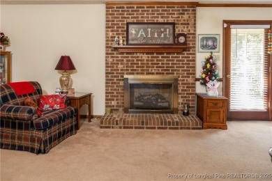 Welcome to this charming 3-bedroom, 2.5-bath home on Hole One of on Sandy Ridge Country Club in North Carolina - for sale on GolfHomes.com, golf home, golf lot