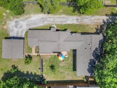 Discover this beautifully updated 4-bedroom, 2-bathroom home on Meadowbrook Golf Course in Texas - for sale on GolfHomes.com, golf home, golf lot