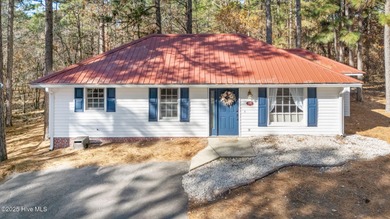 Move right in and relax in this quaint, adorable two bedroom on Beacon Ridge Golf and Country Club in North Carolina - for sale on GolfHomes.com, golf home, golf lot