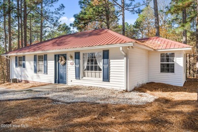 Move right in and relax in this quaint, adorable two bedroom on Beacon Ridge Golf and Country Club in North Carolina - for sale on GolfHomes.com, golf home, golf lot