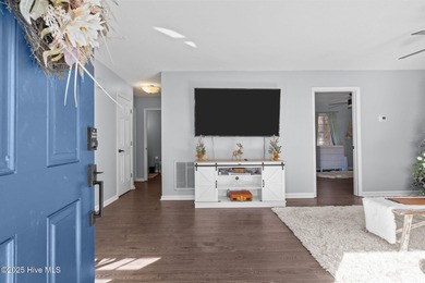 Move right in and relax in this quaint, adorable two bedroom on Beacon Ridge Golf and Country Club in North Carolina - for sale on GolfHomes.com, golf home, golf lot