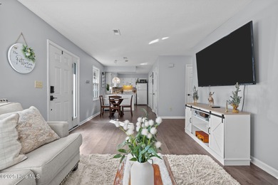 Move right in and relax in this quaint, adorable two bedroom on Beacon Ridge Golf and Country Club in North Carolina - for sale on GolfHomes.com, golf home, golf lot