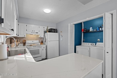 Move right in and relax in this quaint, adorable two bedroom on Beacon Ridge Golf and Country Club in North Carolina - for sale on GolfHomes.com, golf home, golf lot