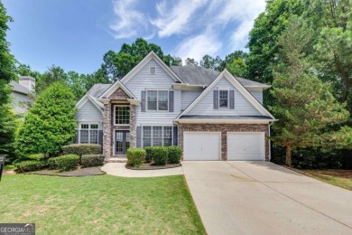 Spacious home nestled in the sought-after Bridgemill community on Bridgemill Golf Club in Georgia - for sale on GolfHomes.com, golf home, golf lot