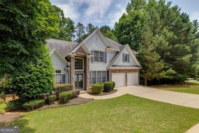 Spacious home nestled in the sought-after Bridgemill community on Bridgemill Golf Club in Georgia - for sale on GolfHomes.com, golf home, golf lot