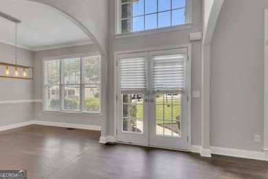 Spacious home nestled in the sought-after Bridgemill community on Bridgemill Golf Club in Georgia - for sale on GolfHomes.com, golf home, golf lot