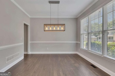 Spacious home nestled in the sought-after Bridgemill community on Bridgemill Golf Club in Georgia - for sale on GolfHomes.com, golf home, golf lot