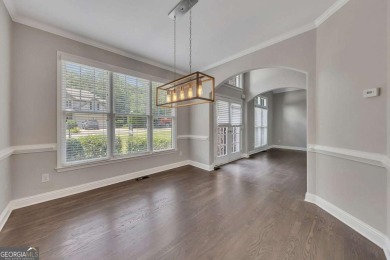 Spacious home nestled in the sought-after Bridgemill community on Bridgemill Golf Club in Georgia - for sale on GolfHomes.com, golf home, golf lot