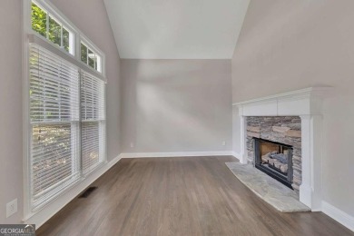Spacious home nestled in the sought-after Bridgemill community on Bridgemill Golf Club in Georgia - for sale on GolfHomes.com, golf home, golf lot