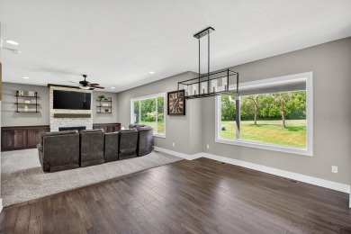 Welcome to 1150 Cardinal Drive-a thoughtfully designed, move-in on Tournament Club of Iowa in Iowa - for sale on GolfHomes.com, golf home, golf lot
