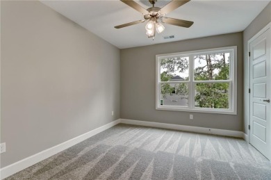 This stunning two-story home by renowned local builder Josselyn on Laurel Island Links in Georgia - for sale on GolfHomes.com, golf home, golf lot