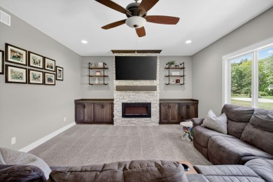 Welcome to 1150 Cardinal Drive-a thoughtfully designed, move-in on Tournament Club of Iowa in Iowa - for sale on GolfHomes.com, golf home, golf lot