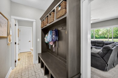 Welcome to 1150 Cardinal Drive-a thoughtfully designed, move-in on Tournament Club of Iowa in Iowa - for sale on GolfHomes.com, golf home, golf lot