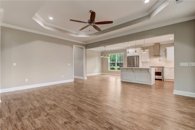 This stunning two-story home by renowned local builder Josselyn on Laurel Island Links in Georgia - for sale on GolfHomes.com, golf home, golf lot