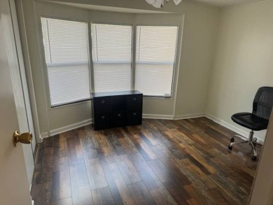 Welcome home to this lovely 2-bedroom, 2-bath oasis in the 55+ on Lake Henry Golf Club in Florida - for sale on GolfHomes.com, golf home, golf lot