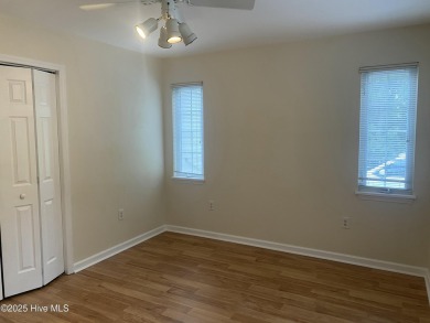 Experience the essence of coastal living in this well maintained on The Country Club of the Crystal Coast in North Carolina - for sale on GolfHomes.com, golf home, golf lot