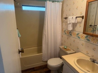 Welcome home to this lovely 2-bedroom, 2-bath oasis in the 55+ on Lake Henry Golf Club in Florida - for sale on GolfHomes.com, golf home, golf lot