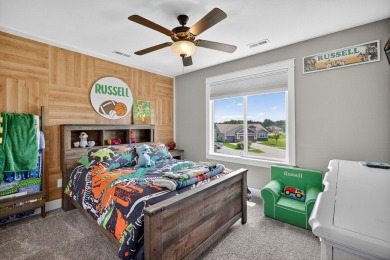 Welcome to 1150 Cardinal Drive-a thoughtfully designed, move-in on Tournament Club of Iowa in Iowa - for sale on GolfHomes.com, golf home, golf lot