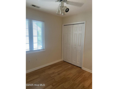 Experience the essence of coastal living in this well maintained on The Country Club of the Crystal Coast in North Carolina - for sale on GolfHomes.com, golf home, golf lot