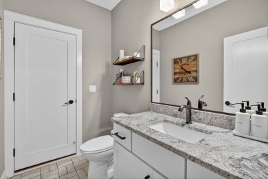 Welcome to 1150 Cardinal Drive-a thoughtfully designed, move-in on Tournament Club of Iowa in Iowa - for sale on GolfHomes.com, golf home, golf lot
