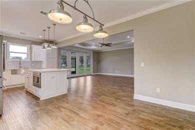 This stunning two-story home by renowned local builder Josselyn on Laurel Island Links in Georgia - for sale on GolfHomes.com, golf home, golf lot