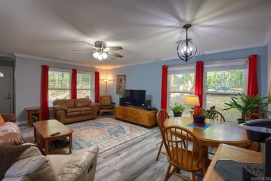 Impeccably updated and in a great location within walking on DeSoto Golf Course in Arkansas - for sale on GolfHomes.com, golf home, golf lot