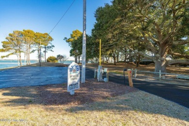 Experience the essence of coastal living in this well maintained on The Country Club of the Crystal Coast in North Carolina - for sale on GolfHomes.com, golf home, golf lot