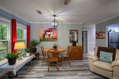 Impeccably updated and in a great location within walking on DeSoto Golf Course in Arkansas - for sale on GolfHomes.com, golf home, golf lot