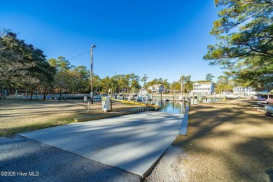 Experience the essence of coastal living in this well maintained on The Country Club of the Crystal Coast in North Carolina - for sale on GolfHomes.com, golf home, golf lot