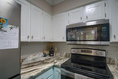 Impeccably updated and in a great location within walking on DeSoto Golf Course in Arkansas - for sale on GolfHomes.com, golf home, golf lot