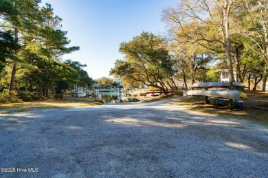 Experience the essence of coastal living in this well maintained on The Country Club of the Crystal Coast in North Carolina - for sale on GolfHomes.com, golf home, golf lot