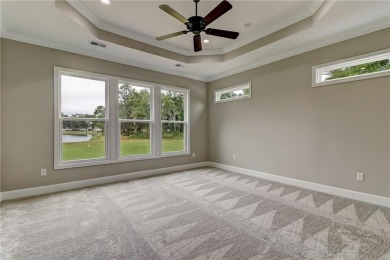 This stunning two-story home by renowned local builder Josselyn on Laurel Island Links in Georgia - for sale on GolfHomes.com, golf home, golf lot
