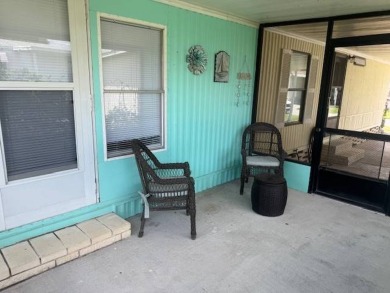 Welcome home to this lovely 2-bedroom, 2-bath oasis in the 55+ on Lake Henry Golf Club in Florida - for sale on GolfHomes.com, golf home, golf lot