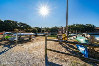 Experience the essence of coastal living in this well maintained on The Country Club of the Crystal Coast in North Carolina - for sale on GolfHomes.com, golf home, golf lot