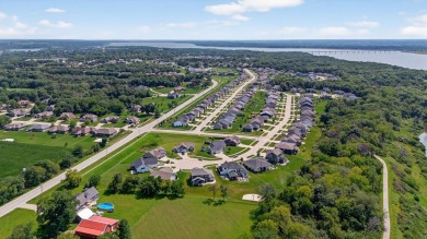 Welcome to 1150 Cardinal Drive-a thoughtfully designed, move-in on Tournament Club of Iowa in Iowa - for sale on GolfHomes.com, golf home, golf lot