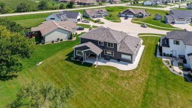 Welcome to 1150 Cardinal Drive-a thoughtfully designed, move-in on Tournament Club of Iowa in Iowa - for sale on GolfHomes.com, golf home, golf lot