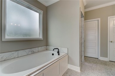 This stunning two-story home by renowned local builder Josselyn on Laurel Island Links in Georgia - for sale on GolfHomes.com, golf home, golf lot